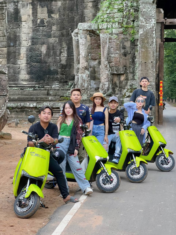 Green e-bike storefront in Siem Reap